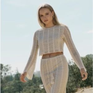 Lucy Paris crotchet and lined top with matching skirt. Brand new never worn.